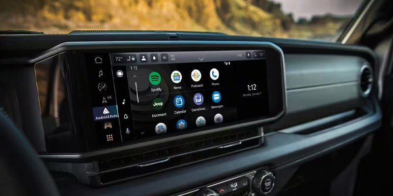 Uconnect infotainment screen displaying application icons.